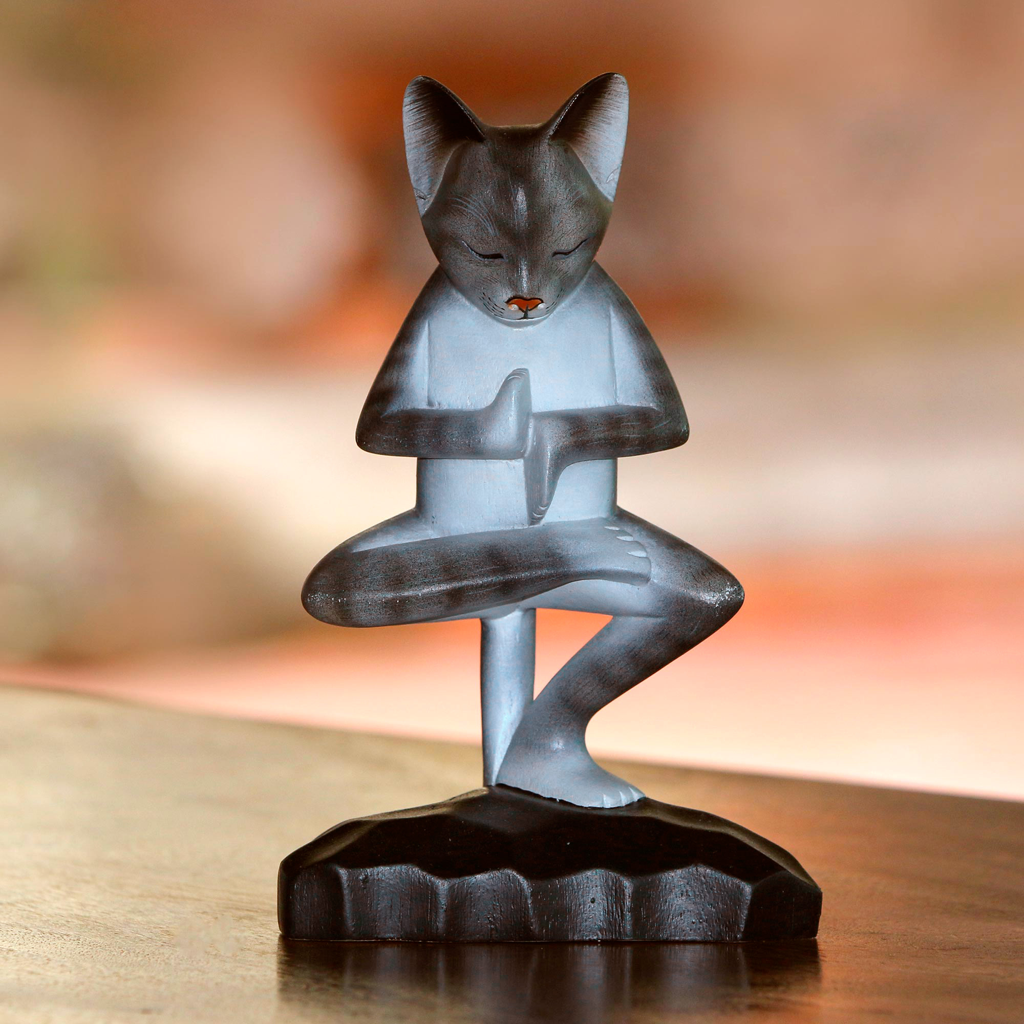 meditating cat sculpture