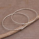 Sterling silver bangle bracelets, 'Why Knot' (pair) - Pair of 925 Sterling Silver Bangle Bracelets from Bali