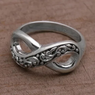 Sterling silver band ring, 'Tangled Vine' - Hand Crafted Sterling Silver Infinity Symbol Ring from Bali