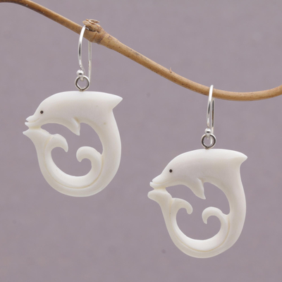 Bone dangle earrings, 'Dolphin Swirl' - Handcrafted Bone Dolphin Dangle Earrings from Bali