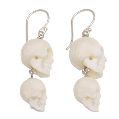 Bone dangle earrings, 'Trunyan Skulls' - Handcrafted Bone Skull Dangle Earrings from Bali
