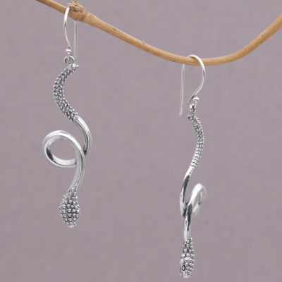 Sterling silver dangle earrings, 'Spectacular Serpent' - Sterling Silver Snake Earrings with Bun Motifs from Bali