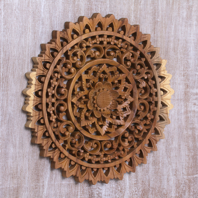 Wood relief panel, 'Sun Bloom' - Hand-Carved Circular Floral Suar Wood Relief Panel from Bali