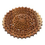 Wood relief panel, 'Sun Bloom' - Hand-Carved Circular Floral Suar Wood Relief Panel from Bali