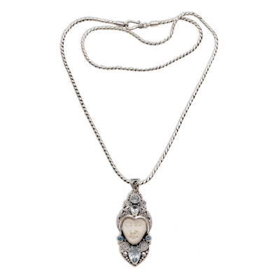 Blue topaz pendant necklace, 'Royal Knight' - Blue Topaz and Sterling Silver Carved Necklace from Bali