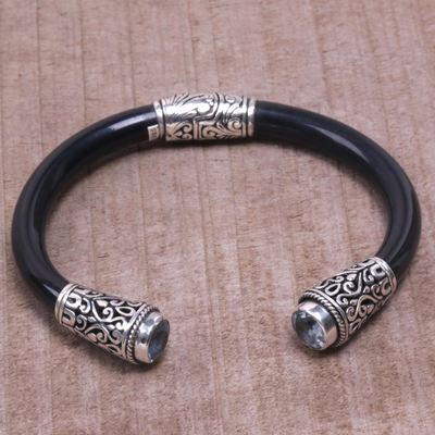 Blue topaz cuff bracelet, 'Heart of the Night' - Blue Topaz and Sterling Silver Cuff Bracelet from Bali