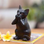 Wood sculpture, 'Kitty Speaks No Evil' - Hand-Carved Black Suar Wood Cat Sculpture from Bali
