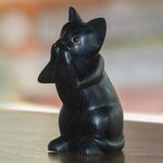 Wood sculpture, 'Kitty Speaks No Evil' - Hand-Carved Black Suar Wood Cat Sculpture from Bali