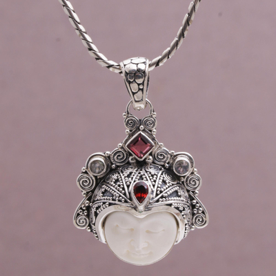 Garnet and rainbow moonstone pendant necklace, 'Diamond Warrior' - Garnet and Sterling Silver Face Pendant Necklace from Bali