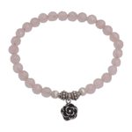 Rose quartz beaded stretch bracelet, 'Still Rose' - Rose Quartz and Flower Charm Beaded Bracelet from Bali