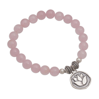 Rose quartz beaded stretch bracelet, 'Lotus Burst' - Rose Quartz and Lotus Charm Beaded Bracelet from BAli