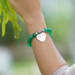 Agate beaded stretch bracelet, 'Path of Love' - Green Agate and Heart Charm Beaded Bracelet from Bali