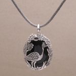 Onyx pendant necklace, 'Mother Heron' - Onyx and Sterling Silver Bird-Themed Necklace from Bali