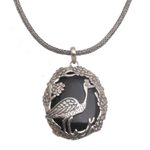 Onyx pendant necklace, 'Mother Heron' - Onyx and Sterling Silver Bird-Themed Necklace from Bali