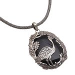 Onyx pendant necklace, 'Mother Heron' - Onyx and Sterling Silver Bird-Themed Necklace from Bali