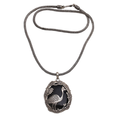 Onyx pendant necklace, 'Mother Heron' - Onyx and Sterling Silver Bird-Themed Necklace from Bali