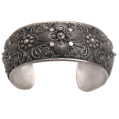 Sterling silver cuff bracelet, 'Temple Blossoms' - Handcrafted Sterling Silver Cuff Bracelet with Floral Motifs