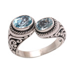 Blue topaz wrap ring, 'Dreamy Gaze' - Blue Topaz Wrap Ring Crafted in Sterling Silver in Bali