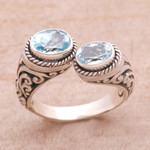 Blue topaz wrap ring, 'Dreamy Gaze' - Blue Topaz Wrap Ring Crafted in Sterling Silver in Bali