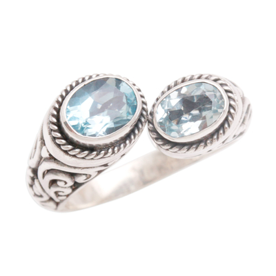 Blue topaz wrap ring, 'Dreamy Gaze' - Blue Topaz Wrap Ring Crafted in Sterling Silver in Bali