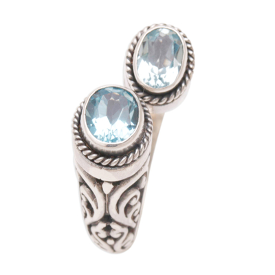 Blue topaz wrap ring, 'Dreamy Gaze' - Blue Topaz Wrap Ring Crafted in Sterling Silver in Bali