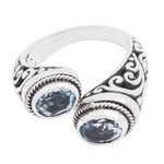 Blue topaz wrap ring, 'Dreamy Gaze' - Blue Topaz Wrap Ring Crafted in Sterling Silver in Bali