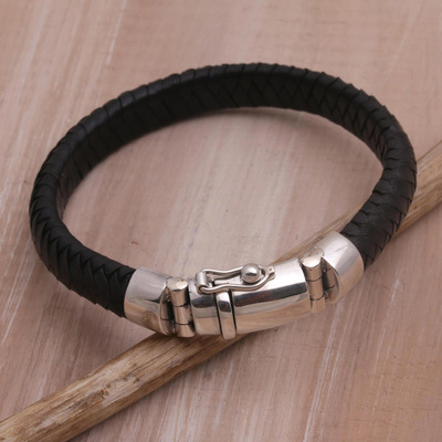 Leather wristband bracelet, 'Shrine Weave in Black' - Black Leather Braided Wristband Bracelet from Bali