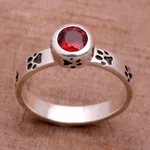 Garnet single stone ring, 'Paws for Celebration' - Garnet and Sterling Silver Single Stone Ring from Bali