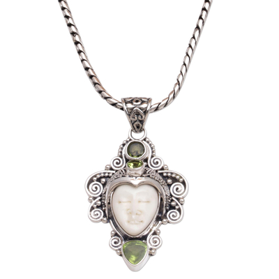 Peridot pendant necklace, 'Moonlight Warrior' - Peridot and Sterling Silver Face Necklace from Bali