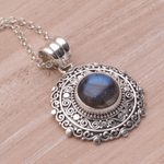 Labradorite pendant necklace, 'Frangipani Secrets' - Labradorite and Sterling Silver Pendant Necklace from Bali