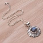 Labradorite pendant necklace, 'Frangipani Secrets' - Labradorite and Sterling Silver Pendant Necklace from Bali