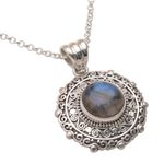 Labradorite pendant necklace, 'Frangipani Secrets' - Labradorite and Sterling Silver Pendant Necklace from Bali