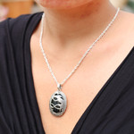 Onyx pendant necklace, 'Lemur Jungle' - Onyx and 925 Silver Lemur Pendant Necklace from Bali