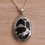 Onyx pendant necklace, 'Avian Curiosity' - Onyx and 925 Silver Bird-Themed Pendant Necklace from Bali thumbail