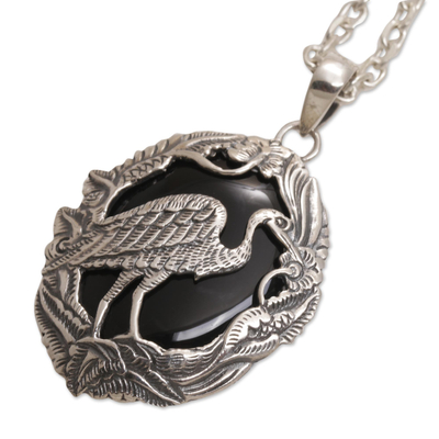 Onyx pendant necklace, 'Heron Haven' - Onyx and Sterling Silver Heron Pendant Necklace from Bali