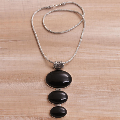 Onyx pendant necklace, 'Night Ovals' - Onyx and Sterling Silver Oval Pendant Necklace from Bali