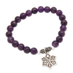 Amethyst beaded charm bracelet, 'Unity Flower' - Amethyst Religious Beaded Stretch Bracelet from Bali