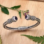 Amethyst cuff bracelet, 'Naga Temple' - Amethyst Naga Motif Sterling Silver Cuff Bracelet from Bali