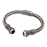 Amethyst cuff bracelet, 'Naga Temple' - Amethyst Naga Motif Sterling Silver Cuff Bracelet from Bali
