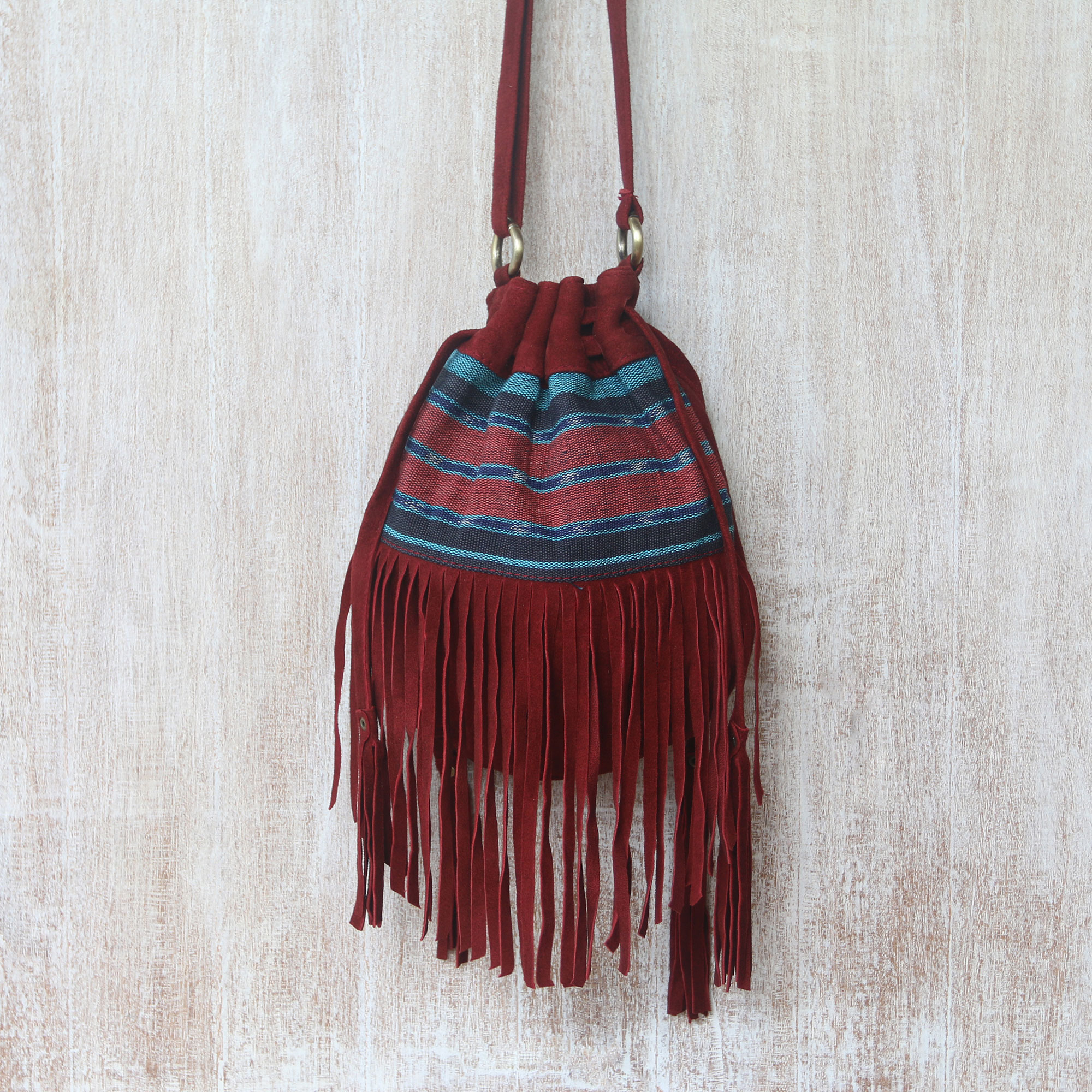 red suede shoulder bag