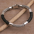 Men's sterling silver and leather bracelet, 'Stay Strong' - Handmade Silver and Leather Men's Bracelet from Bali thumbail