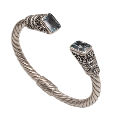 Blue topaz cuff bracelet, 'Majestic Love' - Blue Topaz and Sterling Silver Cuff Bracelet from Bali