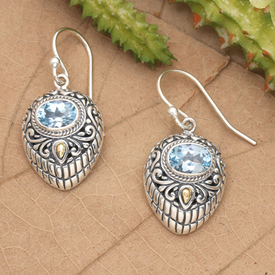 Gold accent blue topaz dangle earrings, 'Swirling Crests' - Gold Accent Blue Topaz and 925 Silver Earrings from Bali