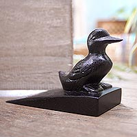 Wood doorstop, 'Helpful Duck in Black' - Handcrafted Suar Wood Duck Doorstop in Black from Bali