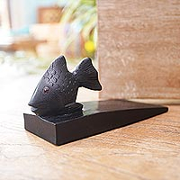Wood doorstop, 'Helpful Goldfish in Black' - Handcrafted Suar Wood Fish Doorstop in Black from Bali