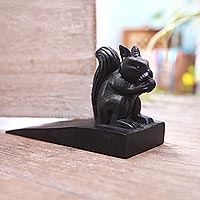 Wood doorstop, 'Helpful Squirrel in Black' - Handcrafted Wood Squirrel Doorstop in Black from Bali