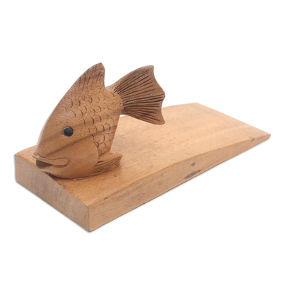 Wood doorstop, 'Helpful Goldfish in Brown' - Handcrafted Suar Wood Fish Doorstop in Brown from Bali