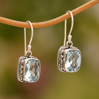 Blue topaz dangle earrings, 'Temple Gleam' - Blue Topaz and Sterling Silver Dangle Earrings from Bali