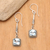 Blue topaz dangle earrings, 'Majestic Gleam' - Faceted Blue Topaz and 925 Silver Dangle Earrings from Bali (image 2b) thumbail