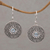 Blue topaz dangle earrings, 'Mystic Shields' - Blue Topaz and 925 Silver Circular Dangle Earrings from Bali